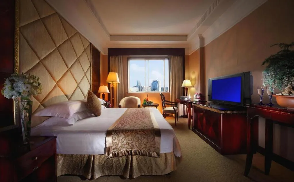 Bed in New Century Hotel Taizhou