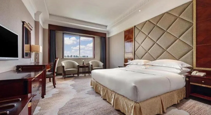 Bed in New Century Hotel Taizhou