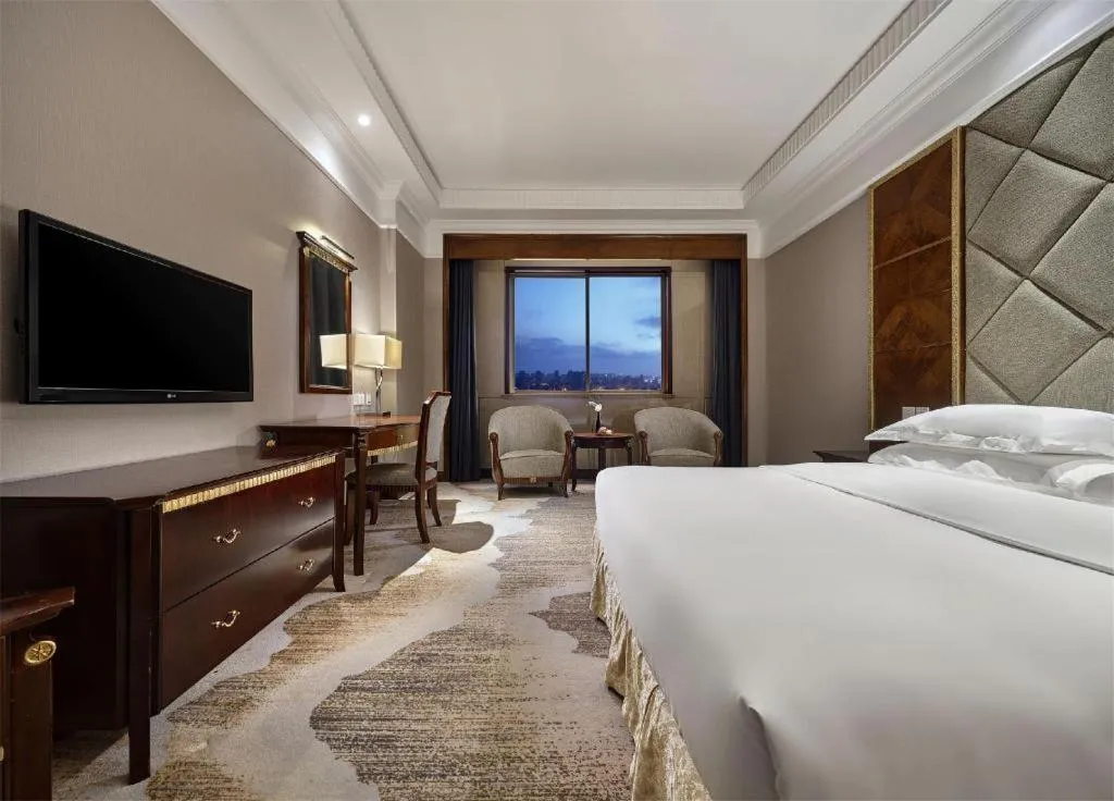 Bed in New Century Hotel Taizhou