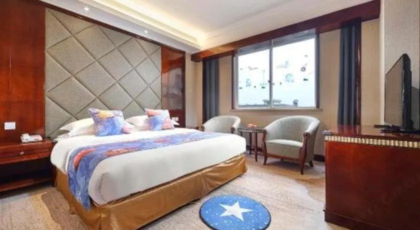 Bed in New Century Hotel Taizhou