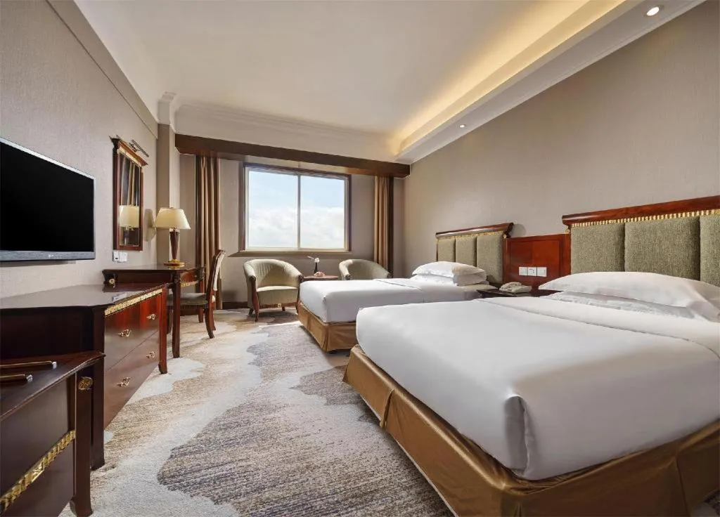 Bed in New Century Hotel Taizhou