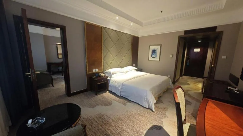 Bed in New Century Hotel Taizhou