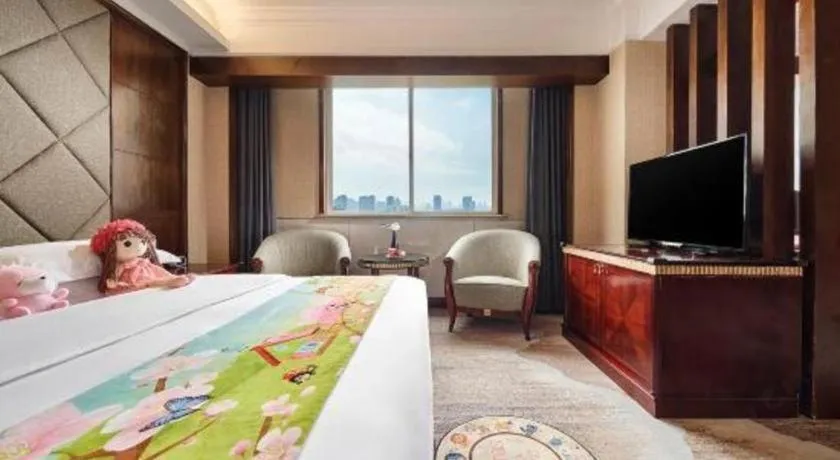 Bed in New Century Hotel Taizhou