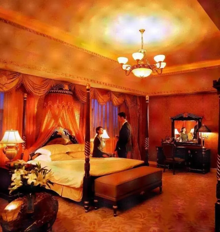 Bed in New Century Hotel Taizhou