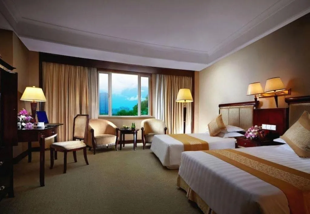 Bed in New Century Hotel Taizhou
