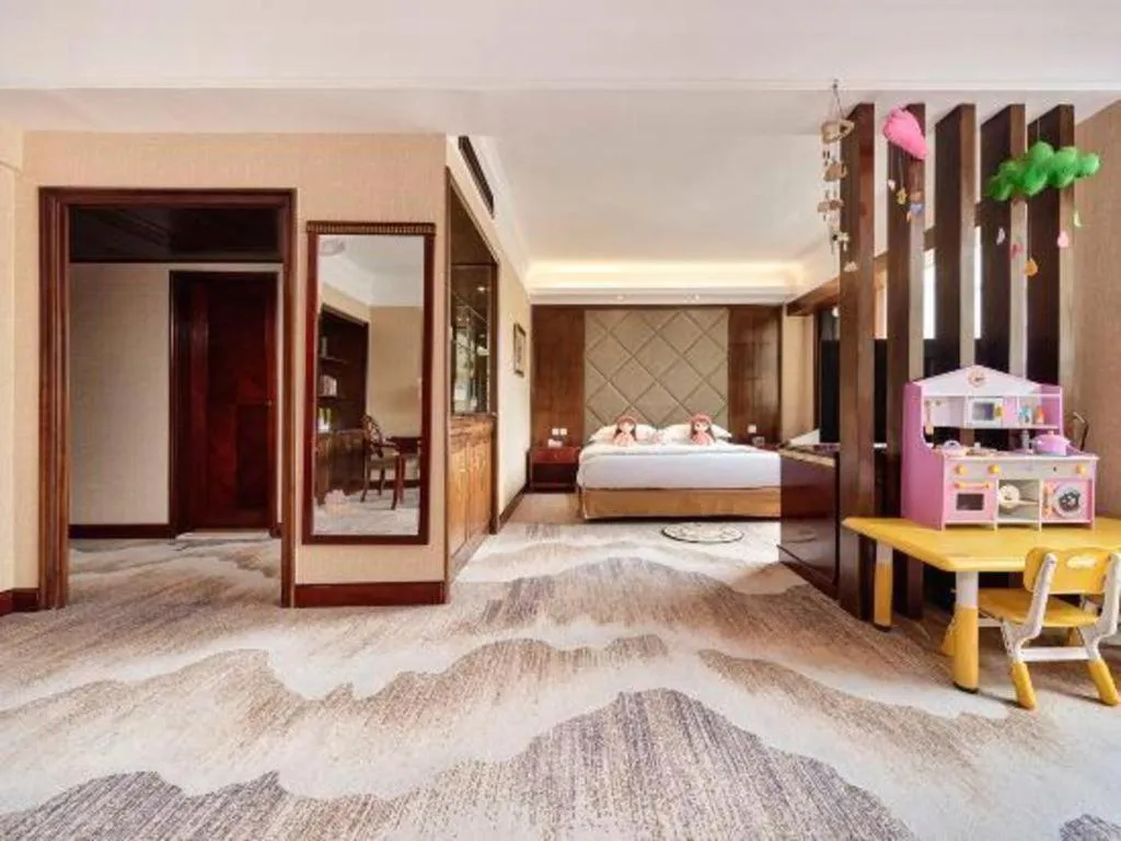 Bed in New Century Hotel Taizhou