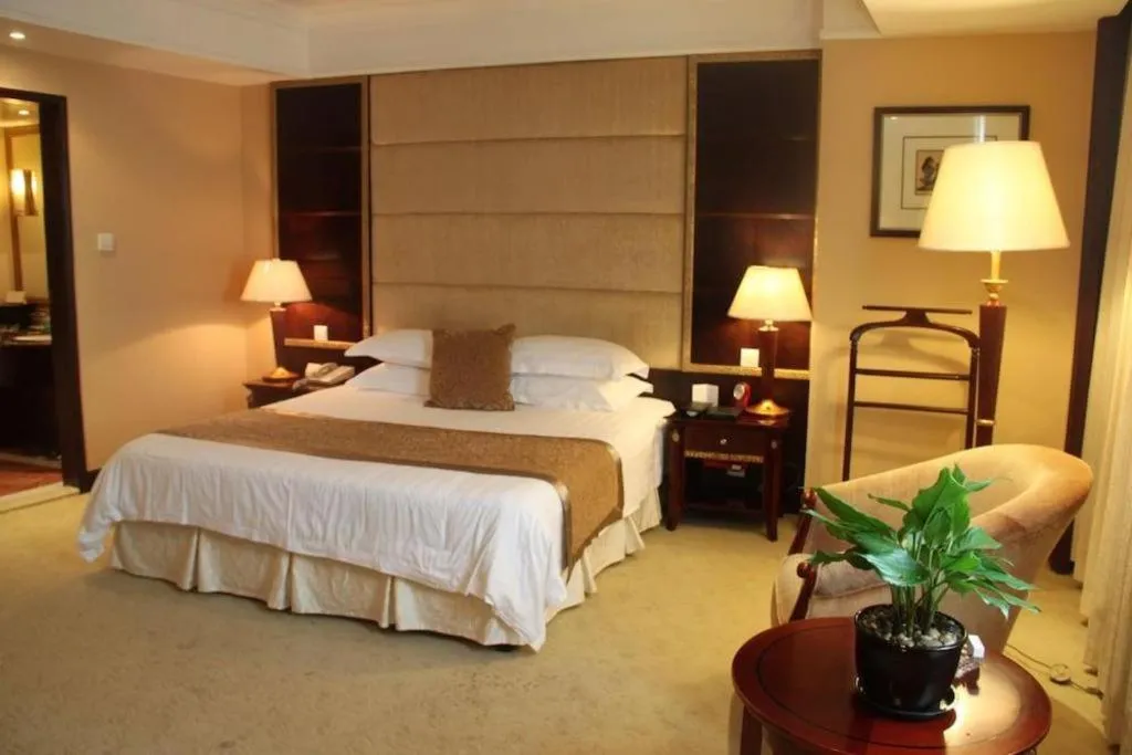 Bed in New Century Hotel Taizhou