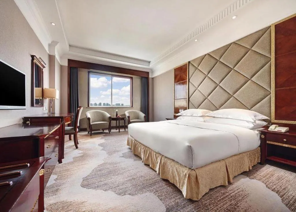 Bed in New Century Hotel Taizhou