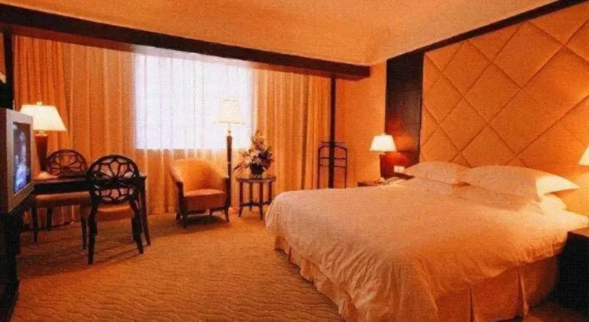 Bed in New Century Hotel Taizhou