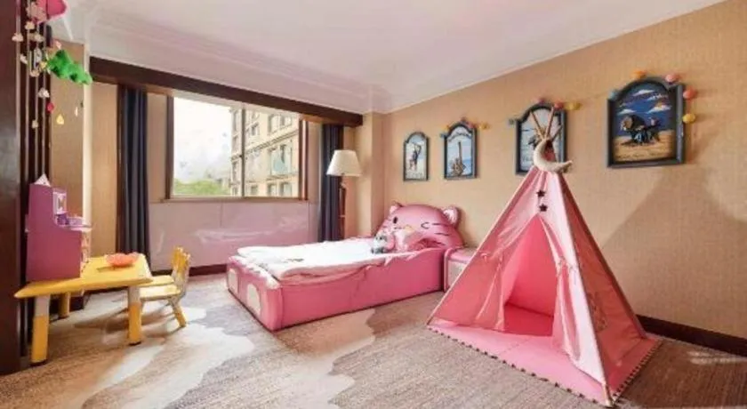 Bed in New Century Hotel Taizhou