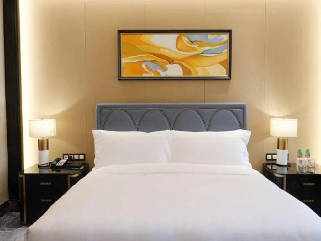 Bed in Chateau StarRiver Guangzhou Peninsula