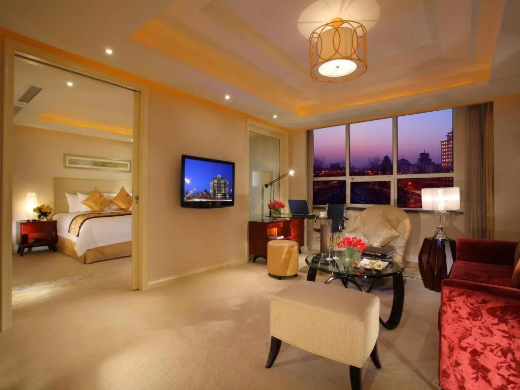 Bed in New Century Grand Changchun Hotel