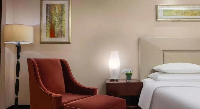 Bed in New Century Grand Changchun Hotel