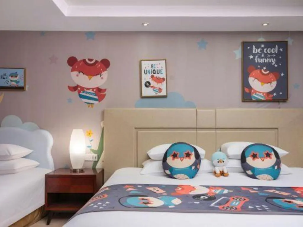 Bed in New Century Grand Changchun Hotel