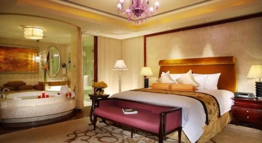 Bed in New Century Grand Changchun Hotel