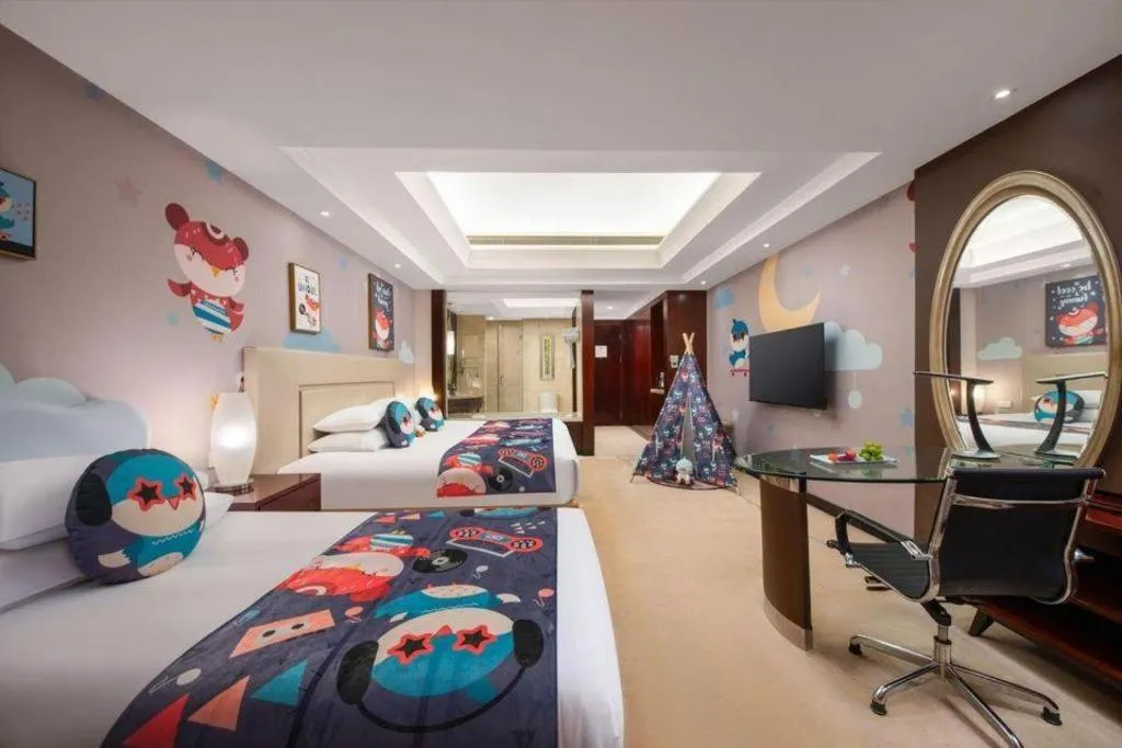 Bed in New Century Grand Changchun Hotel