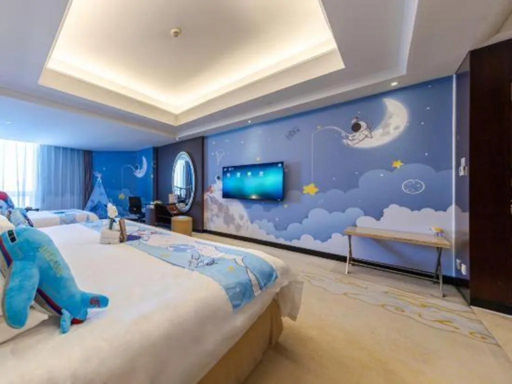 Bed in New Century Grand Changchun Hotel