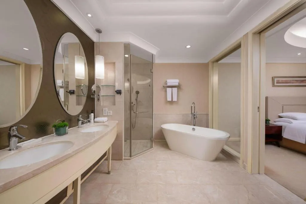 Bed in New Century Grand Changchun Hotel