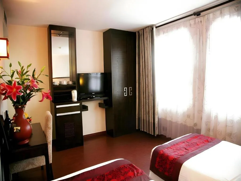 Bed in New Moon Hotel