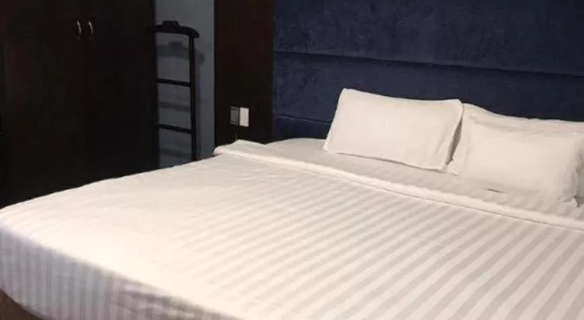 Bed in New Moon Hotel