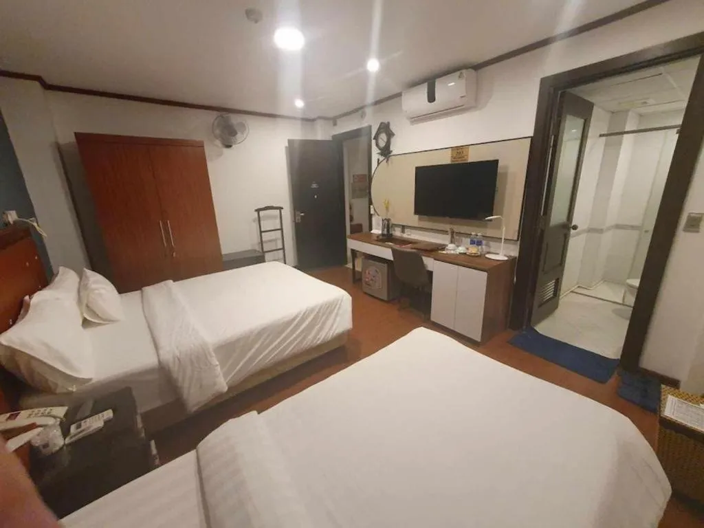 Bed in New Moon Hotel