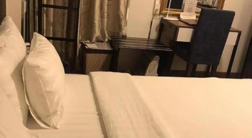 Bed in New Moon Hotel