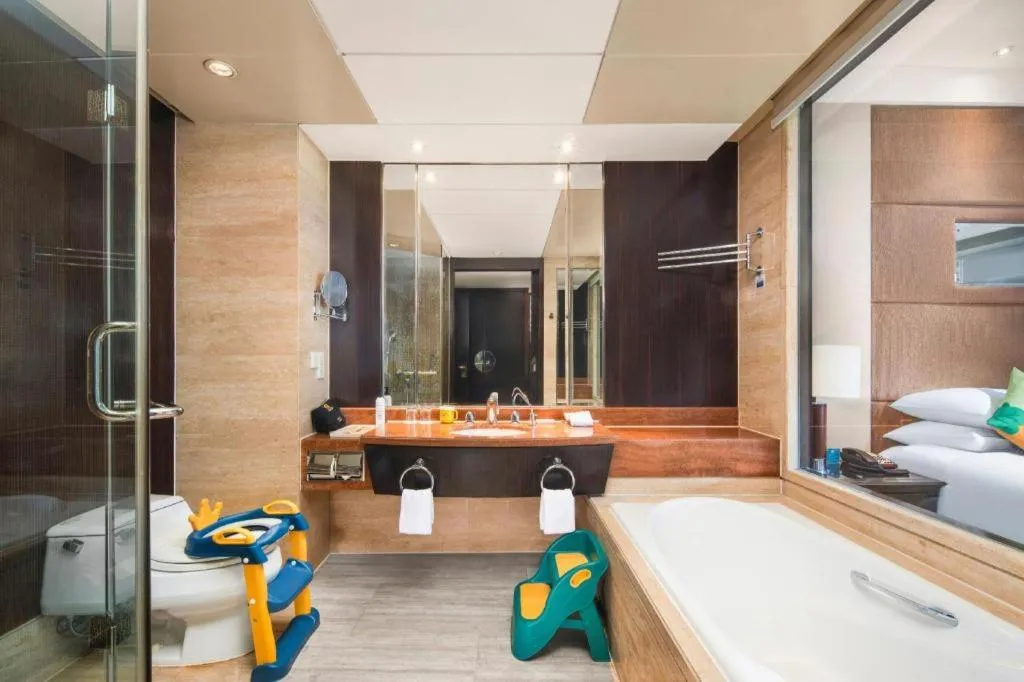 Bed in New Century Grand Hotel Xuzhou