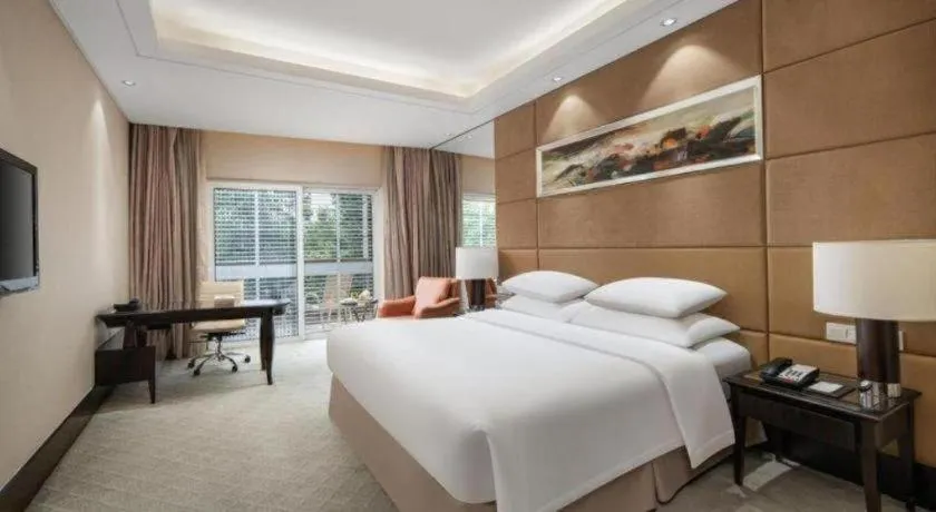 Bed in New Century Grand Hotel Xuzhou