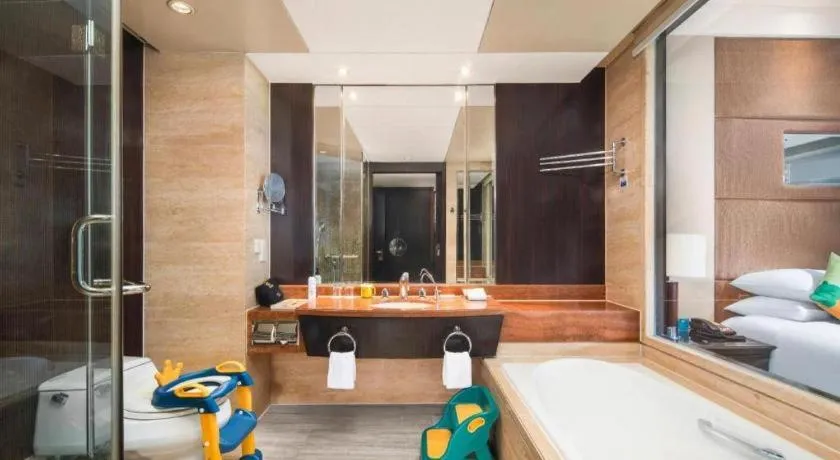 Bed in New Century Grand Hotel Xuzhou