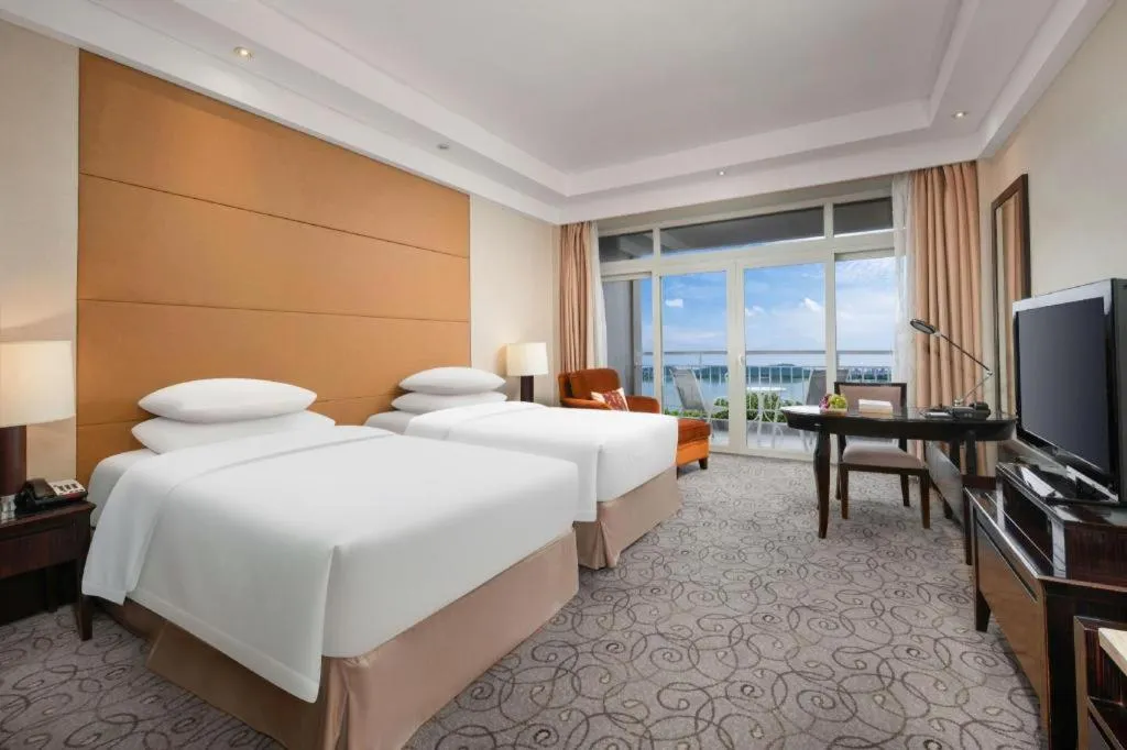 Bed in New Century Grand Hotel Xuzhou