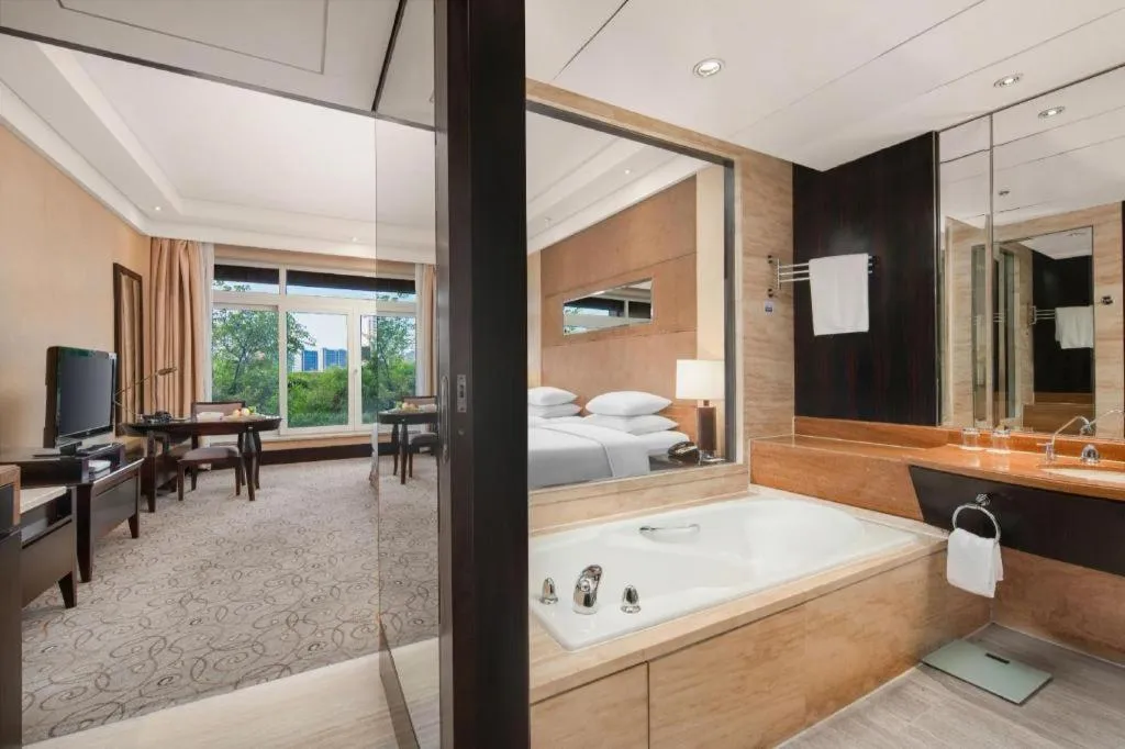 Bed in New Century Grand Hotel Xuzhou