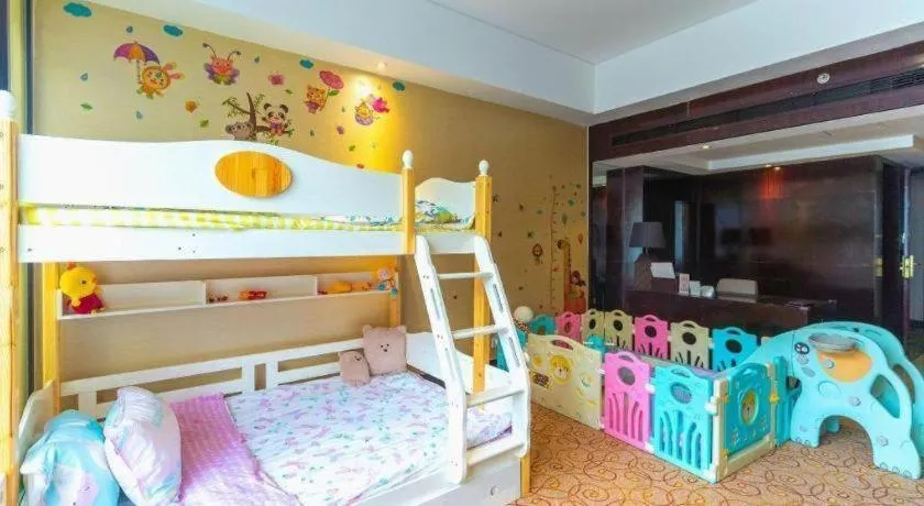 Bed in New Century Grand Hotel Xuzhou