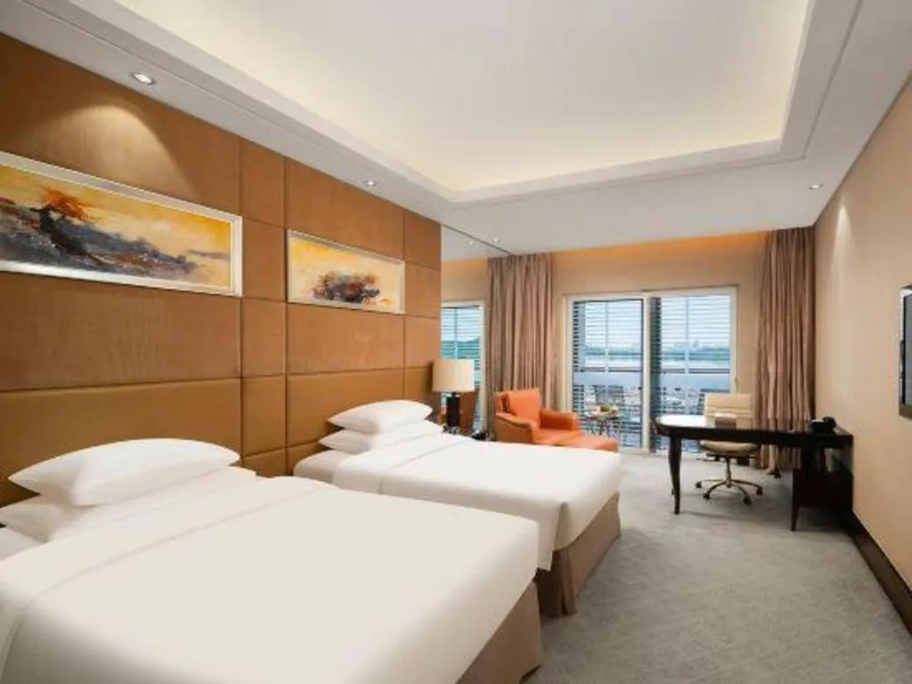 Bed in New Century Grand Hotel Xuzhou