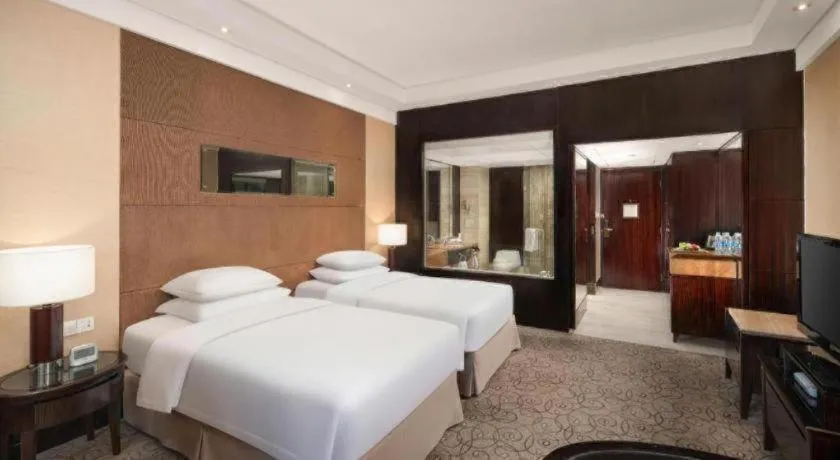 Bed in New Century Grand Hotel Xuzhou
