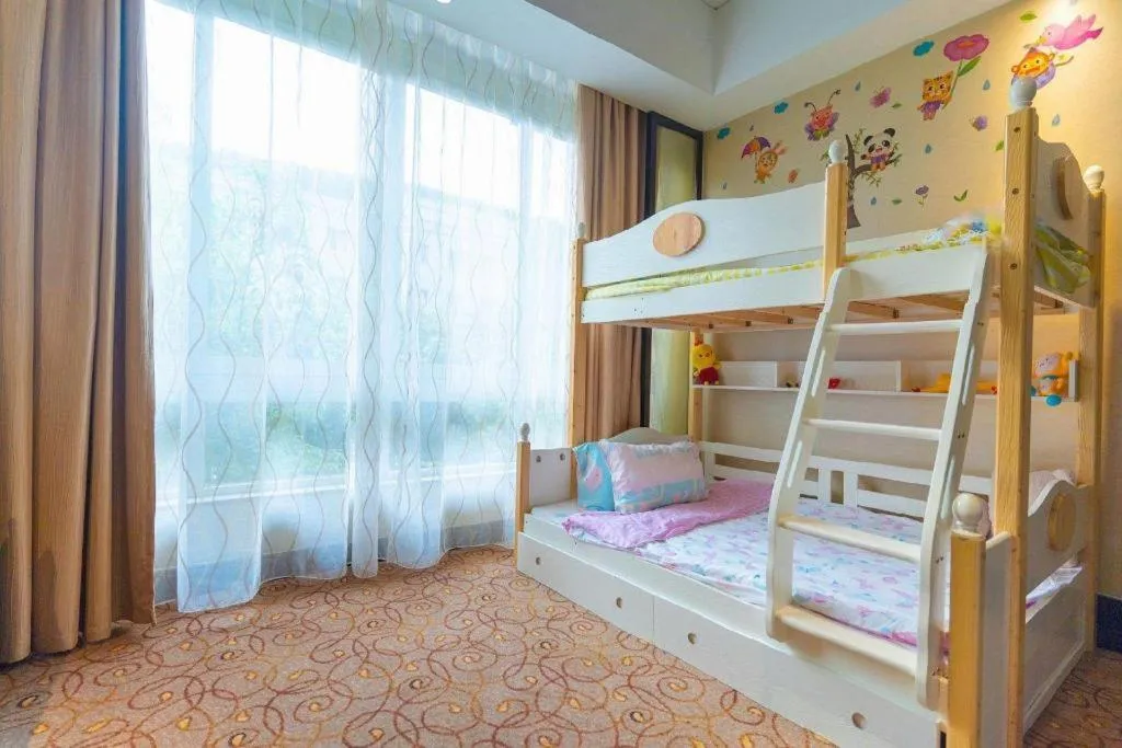 Bed in New Century Grand Hotel Xuzhou