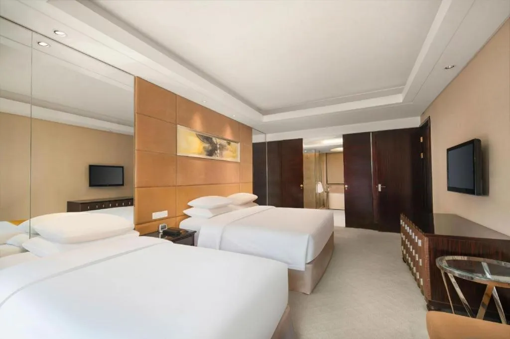 Bed in New Century Grand Hotel Xuzhou