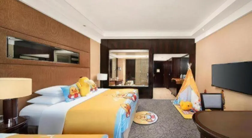 Bed in New Century Grand Hotel Xuzhou