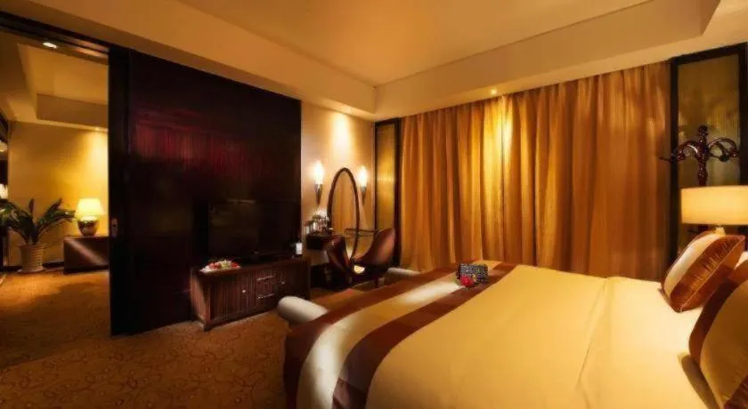Bed in New Century Grand Hotel Xuzhou