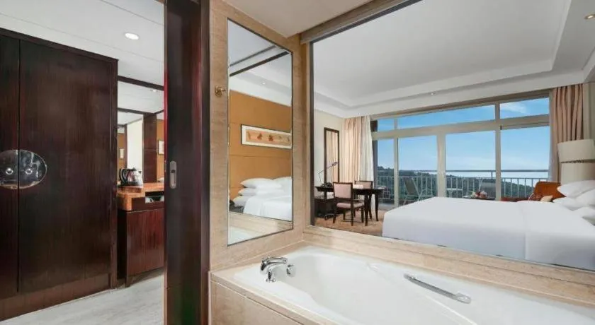 Bed in New Century Grand Hotel Xuzhou