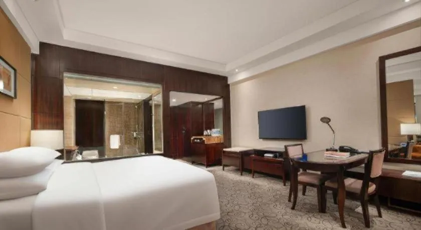 Bed in New Century Grand Hotel Xuzhou