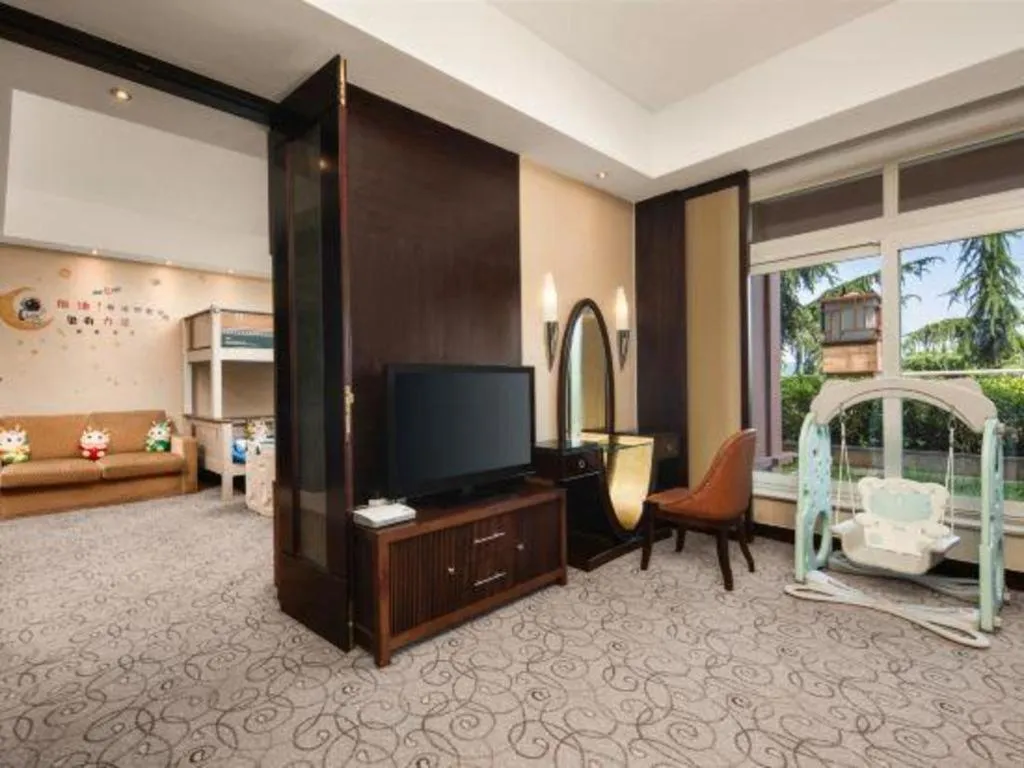 Bed in New Century Grand Hotel Xuzhou