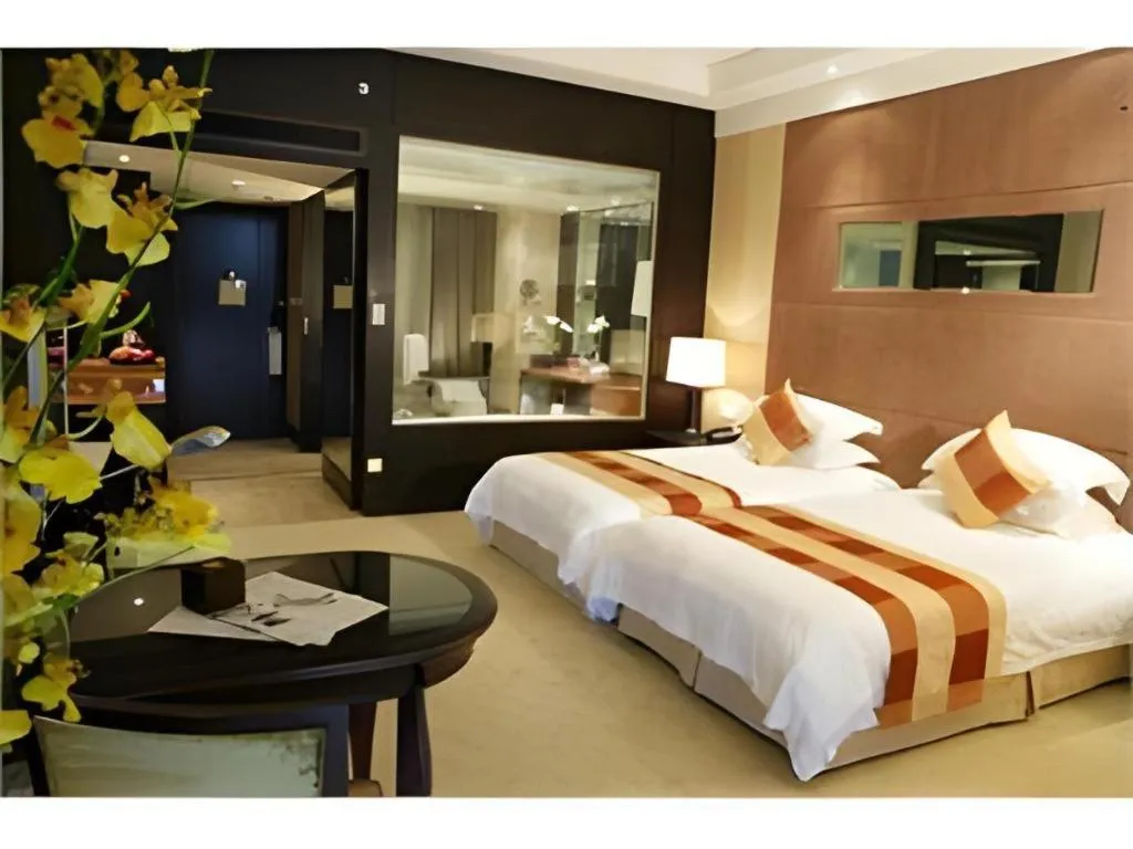 Bed in New Century Grand Hotel Xuzhou