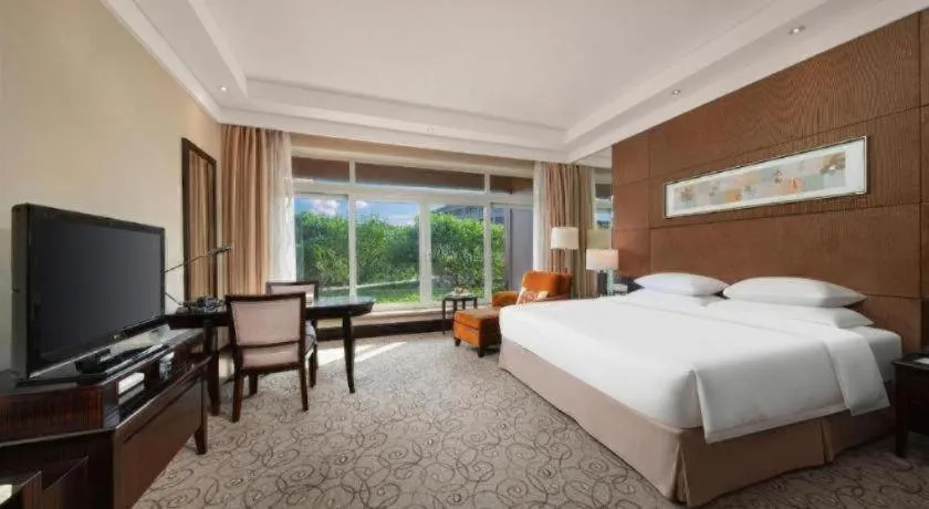 Bed in New Century Grand Hotel Xuzhou