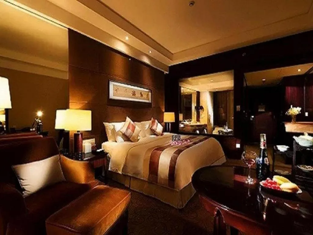 Bed in New Century Grand Hotel Xuzhou