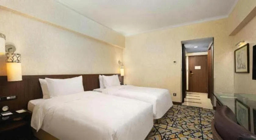 Bed in Xian Grand Noble Hotel