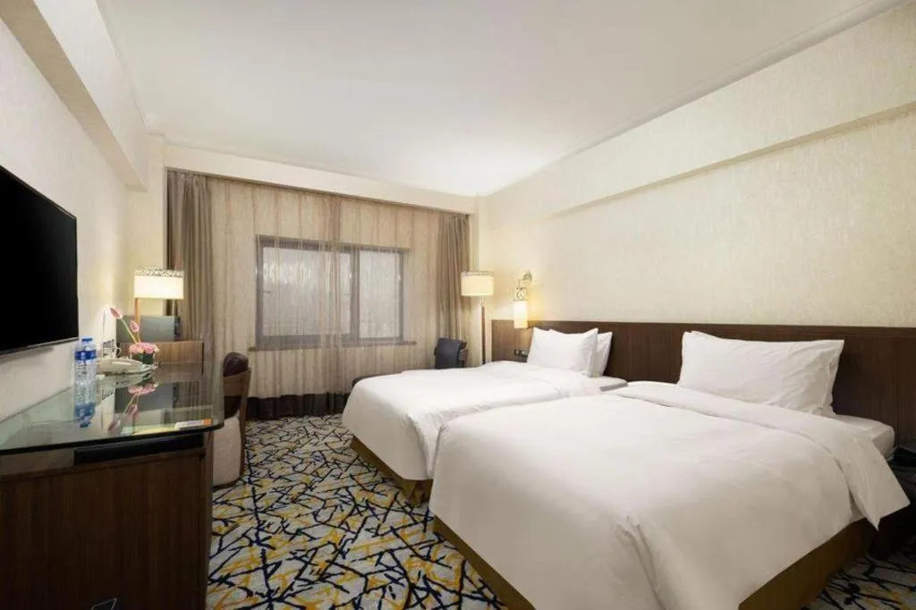 Bed in Xian Grand Noble Hotel