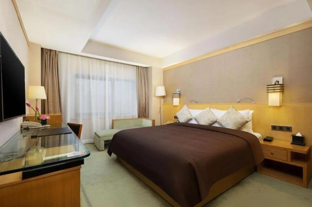 Bed in Xian Grand Noble Hotel