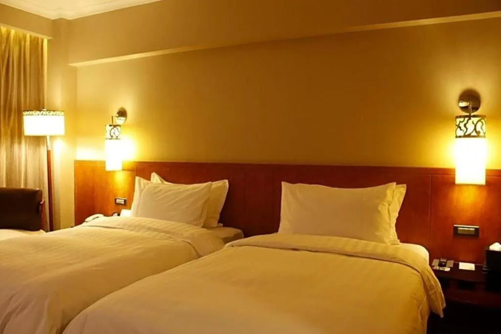 Bed in Xian Grand Noble Hotel