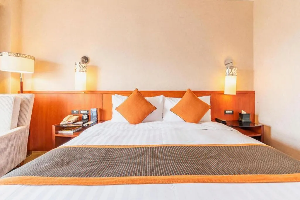 Bed in Xian Grand Noble Hotel