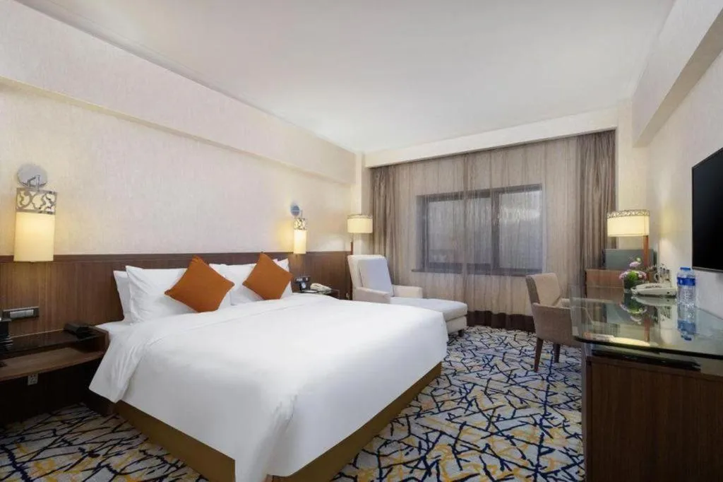 Bed in Xian Grand Noble Hotel